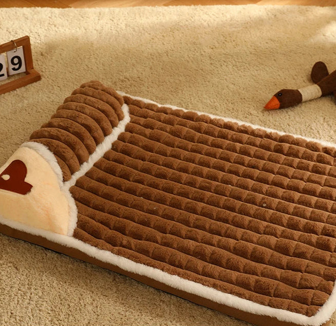 Lit traversin moelleux avec housse lessivable